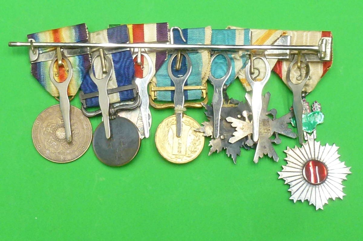 Japanese  medal bar with golden Kite order.jpg