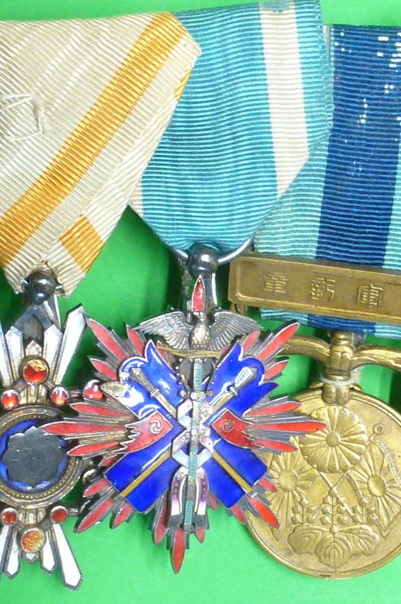 Japanese medal bar with golden  Kite order.jpg