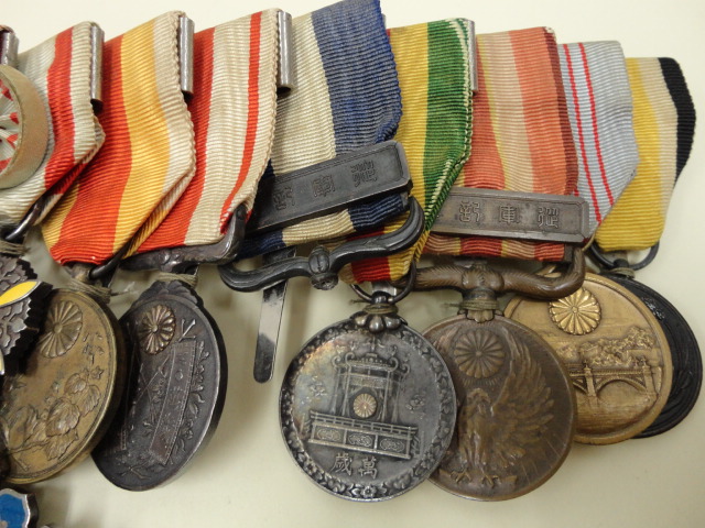 Japanese Medal Bar with Manchukuo Awards-.jpg