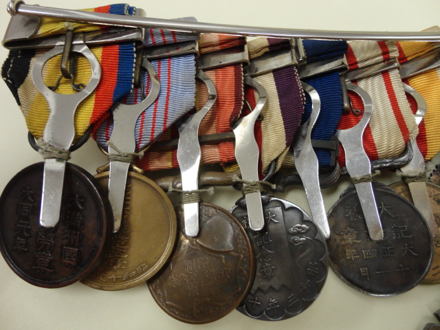 Japanese Medal Bar with Manchukuo Awards  -.jpg