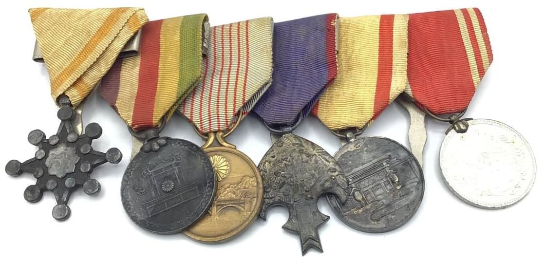 Japanese medal bar with Manchukuo Awards.jpg