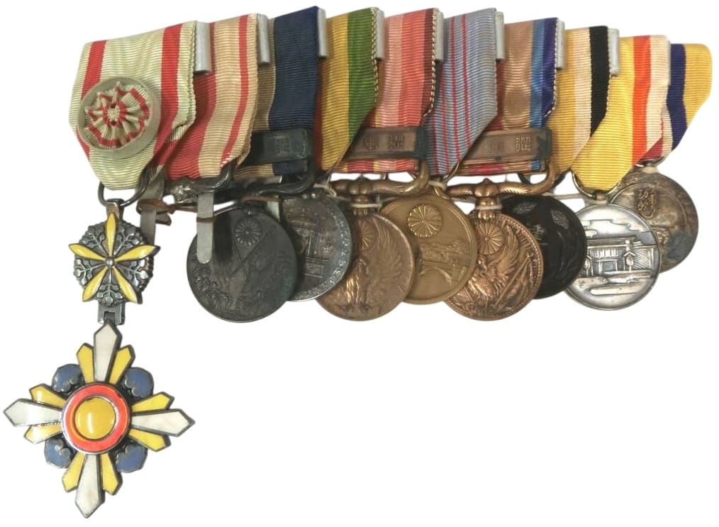 Japanese  Medal Bar  with Manchukuo Order and Inner Mongolia Medal.jpg