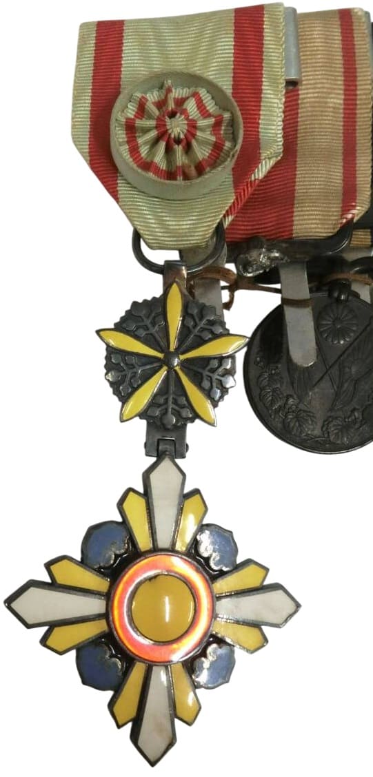 Japanese  Medal Bar with Manchukuo Order and Inner Mongolia  Medal.jpg