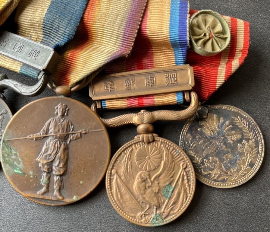 Japanese  Medal Bar  with  marked orders 七 美.jpg