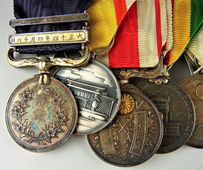 Japanese Medal Bar with  Medal  of the Holy See.jpg