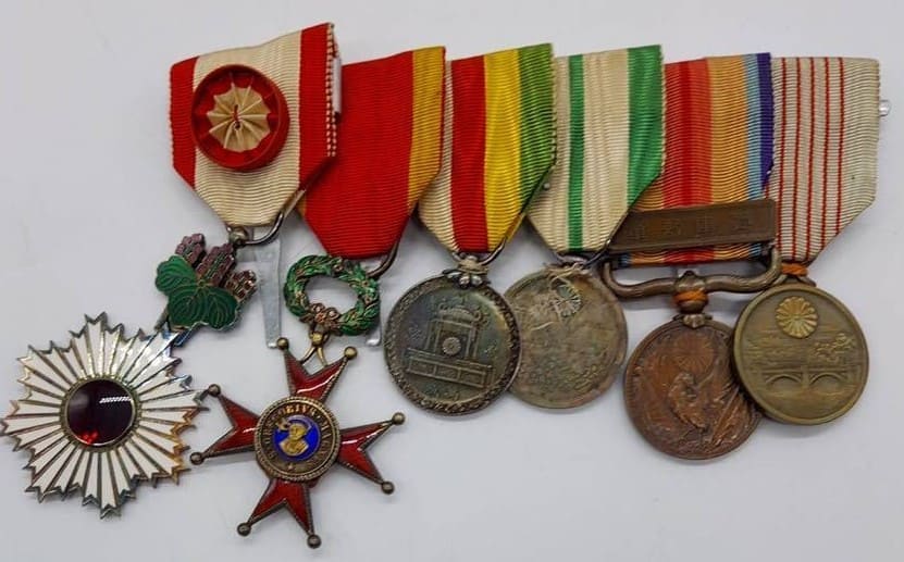 Japanese medal bar with Order of St. Gregory the Great.jpg