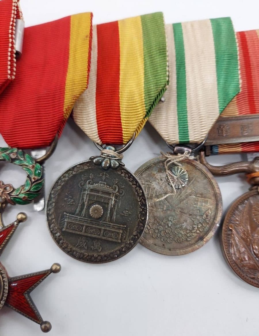 Japanese medal bar  with Order of St. Gregory the Great.jpg
