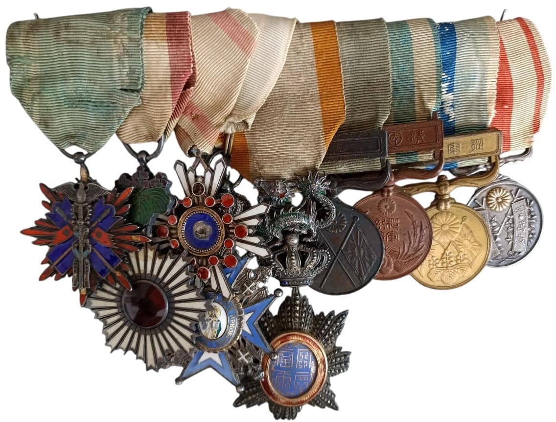 Japanese Medal Bar with Order of the Dragon of Annam.jpg