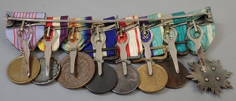 Japanese Medal Bar with the Golden Kite order.jpg