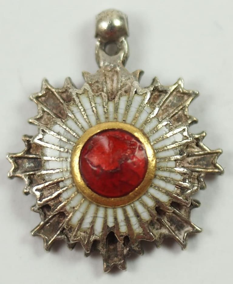 Japanese Order of Rising Sun breast star miniature..jpg