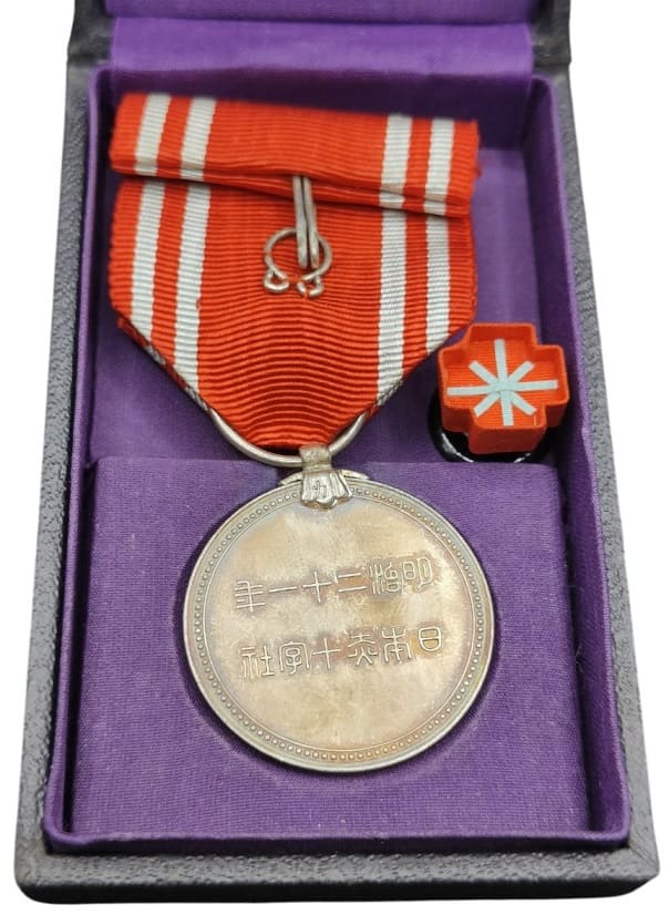 Japanese Red Cross  Medal in Wartime Cardboard Case.jpg