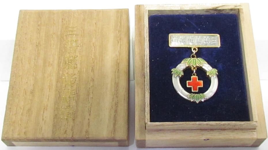 Japanese Red Cross Society Charity Cased Badge  with mark ナ.jpg