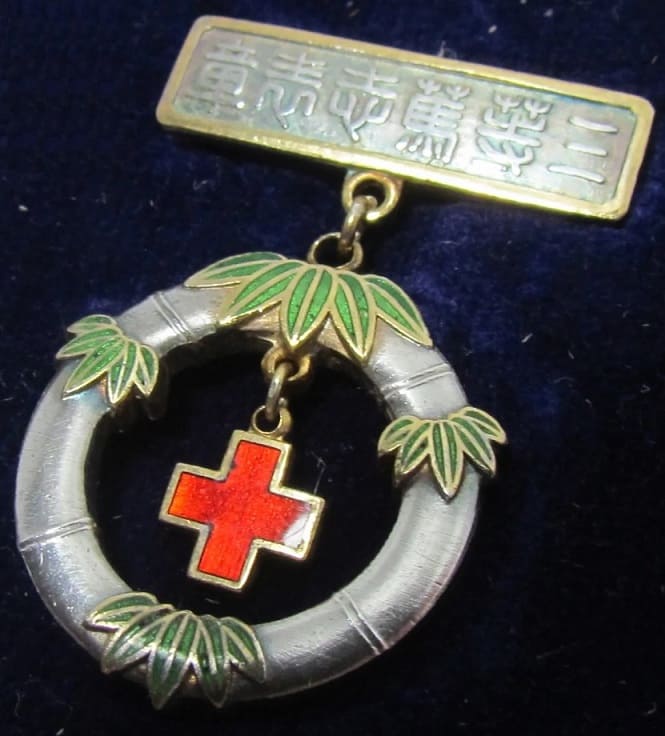 Japanese Red Cross Society Charity  Cased Badge  with mark ナ.jpg