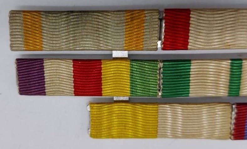 Japanese Ribbon Bar with  Order  and Medal of the Holy See.jpg