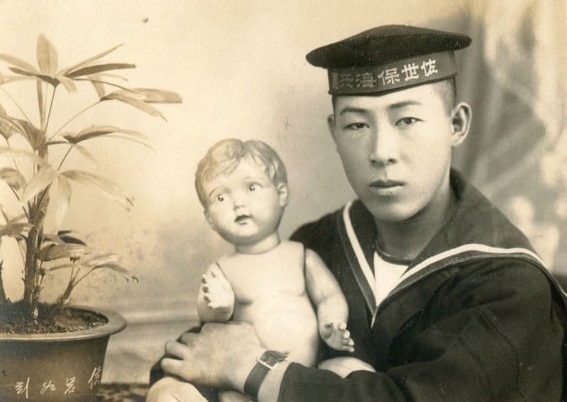 Japanese Sailor with Doll.jpeg