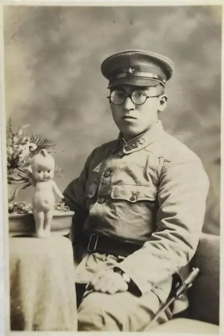 Japanese Soldier with Doll.jpg