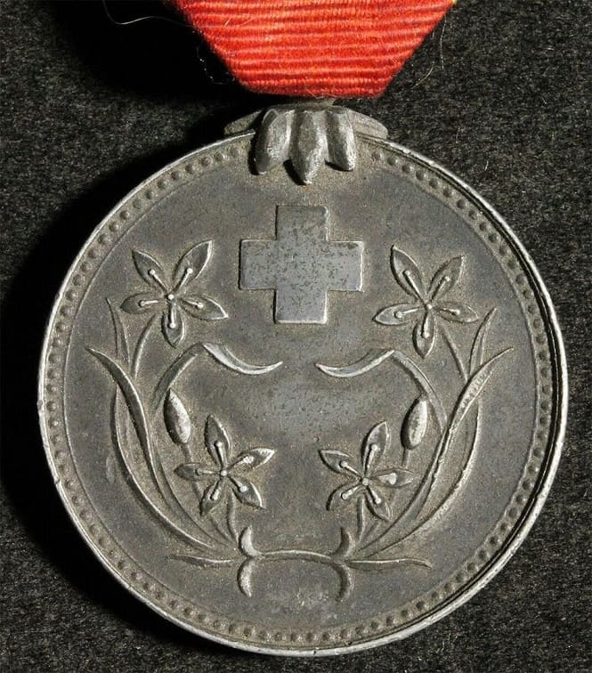 Late War Manchukuo Red Cross Society Lifetime Regular Supporter Member Medal.jpg