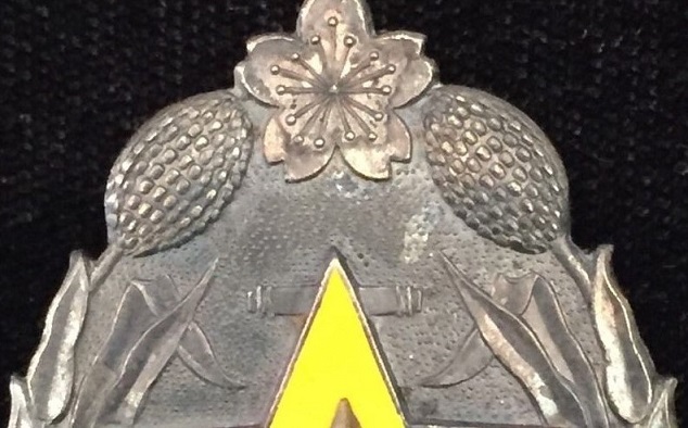 Manchukuo Meritorious Supporter's   Badge.jpg