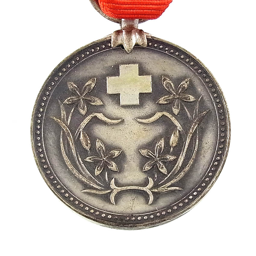 Manchukuo  Red Cross Society Lifetime  Supporter Member Medal 満州国赤十字社終身正賛助員章.JPG
