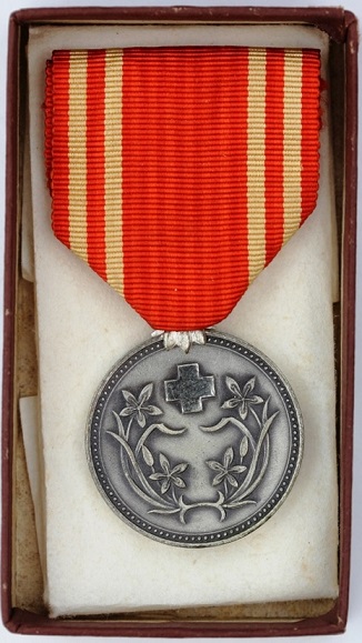 Manchukuo Red Cross Society Regular Supporter Member  Medal.jpg