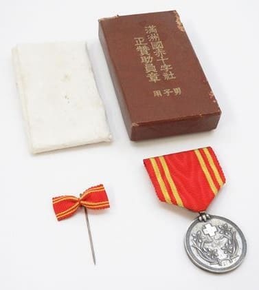 Manchukuo  Red Cross Society Regular Supporter Member Medal.jpg