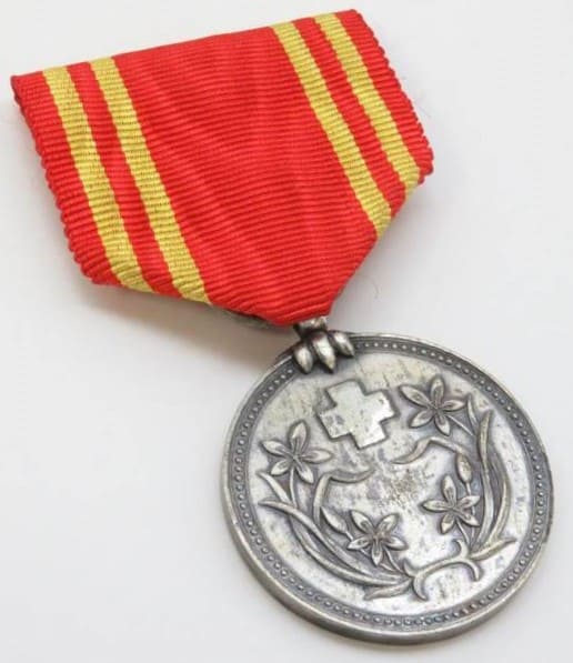 Manchukuo Red Cross Society Regular Supporter  Member Medal.jpg