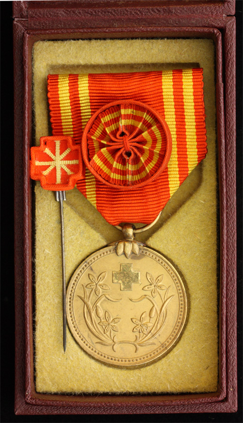Manchukuo Red Cross Society  Special Supporter  Member Medal.jpg