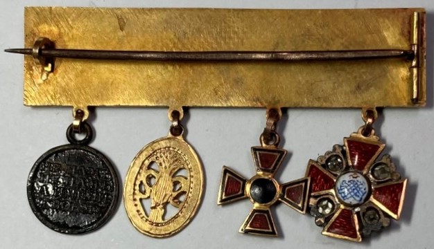 Miniature medal  bar with Russian orders.jpg