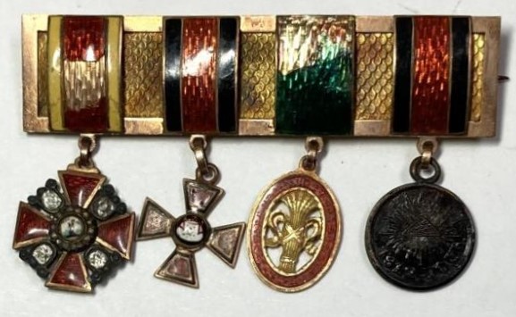Miniature medal bar with Russian orders.jpg