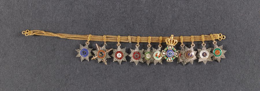 Miniature Russian breast stars of orders.jpg