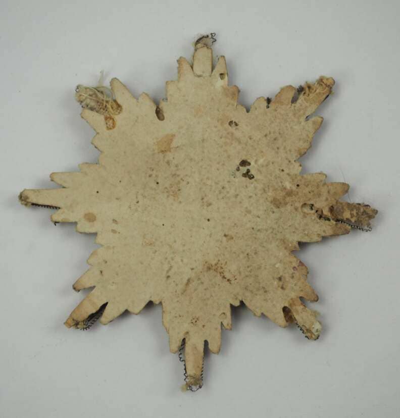 Officially issued Kapitul  embroidered breast star of Saint Anna order.jpeg
