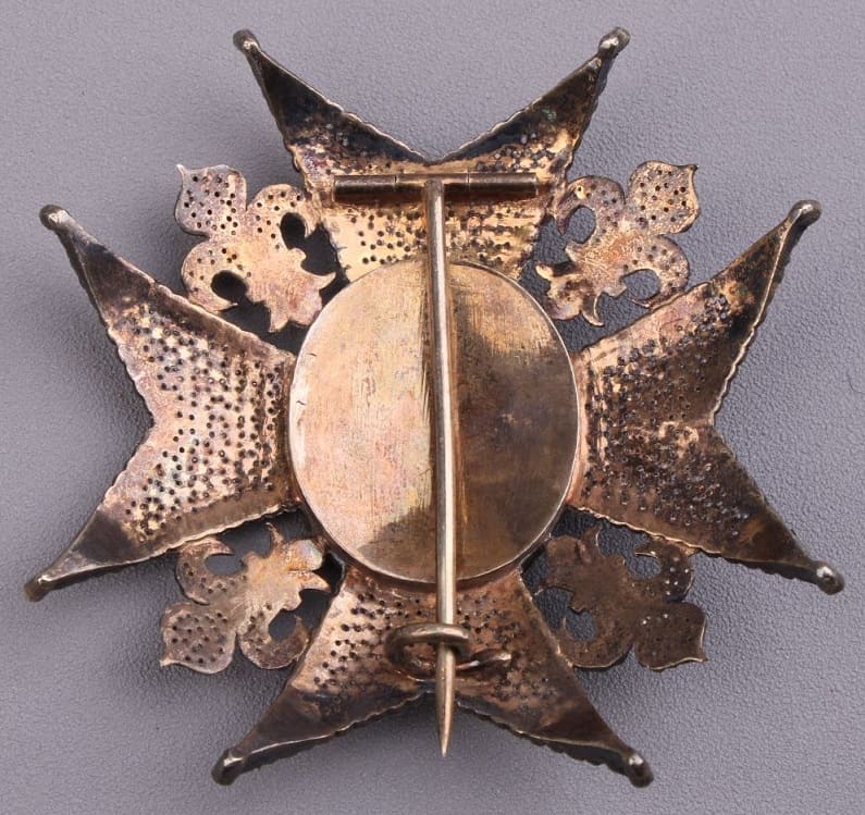 Order of Charles  III breast star.jpg