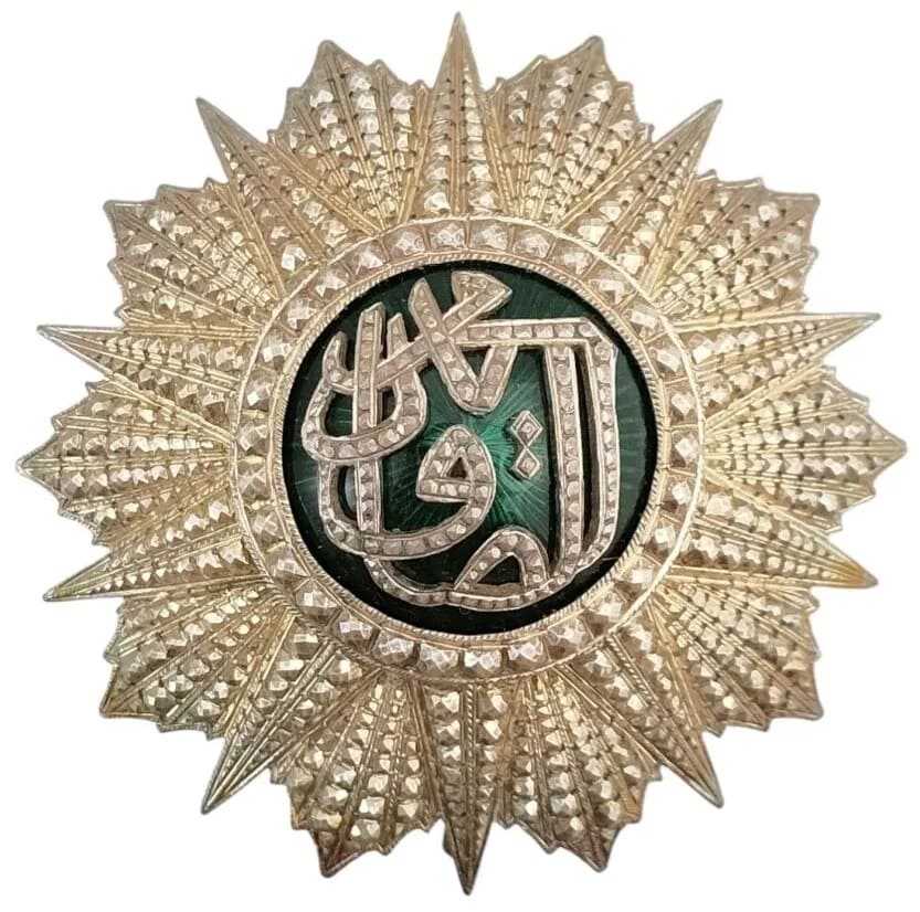 Order  of Nishan-Iftikar breast star made by Halley.jpg Order  of Nishan-Iftikar breast star made by Halley.jpg