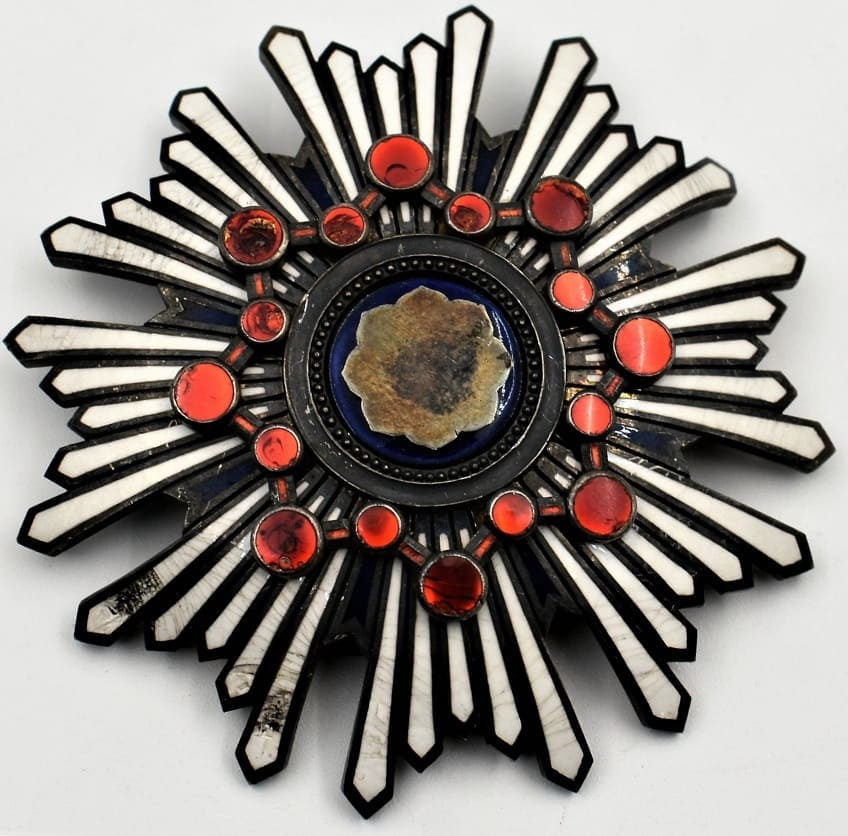 Order of the Sacred Treasure breast star with mark ヒ.jpg