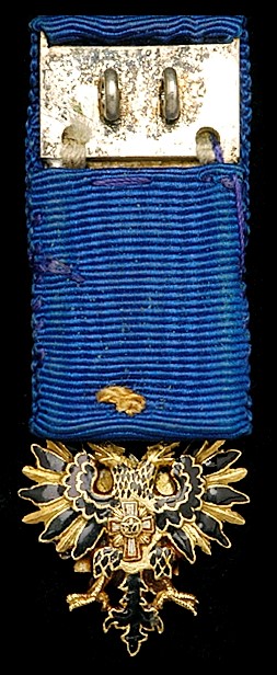 Order of the White Eagle dress miniature of the badge.jpg