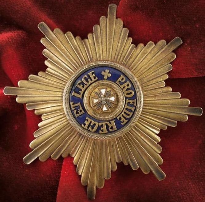 Order of the White Eagle fake breast star.jpg