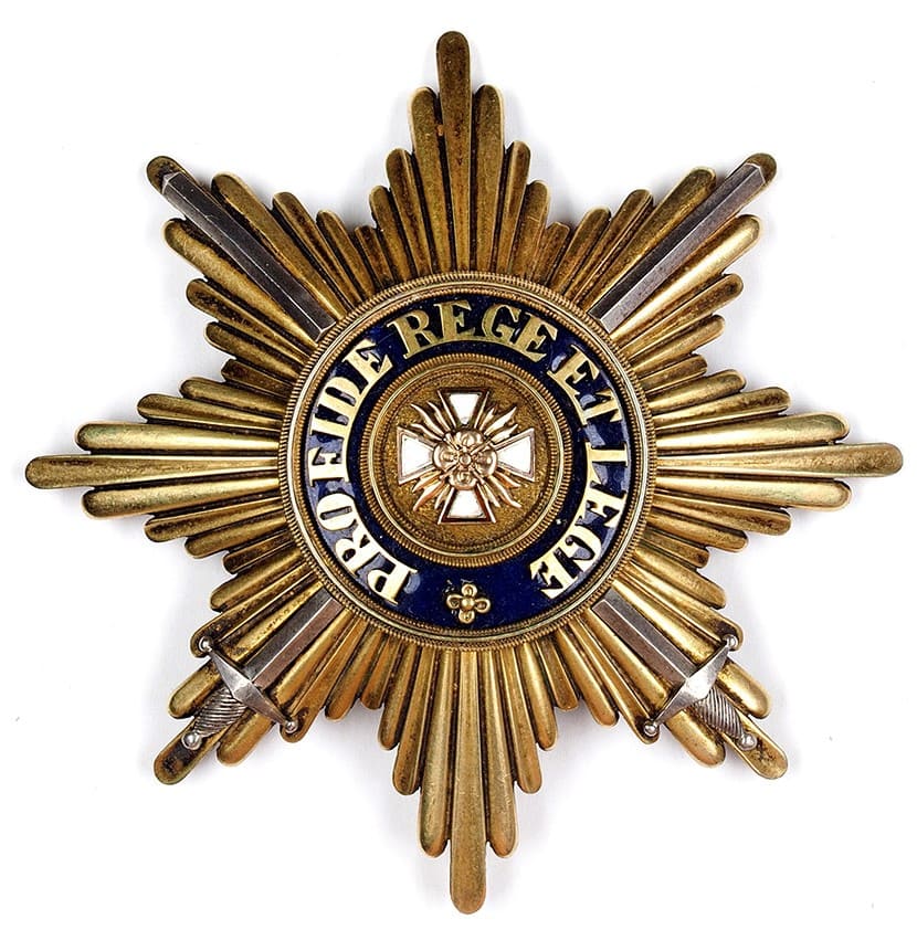 Order of the White Eagle fake breast star with swords.jpg