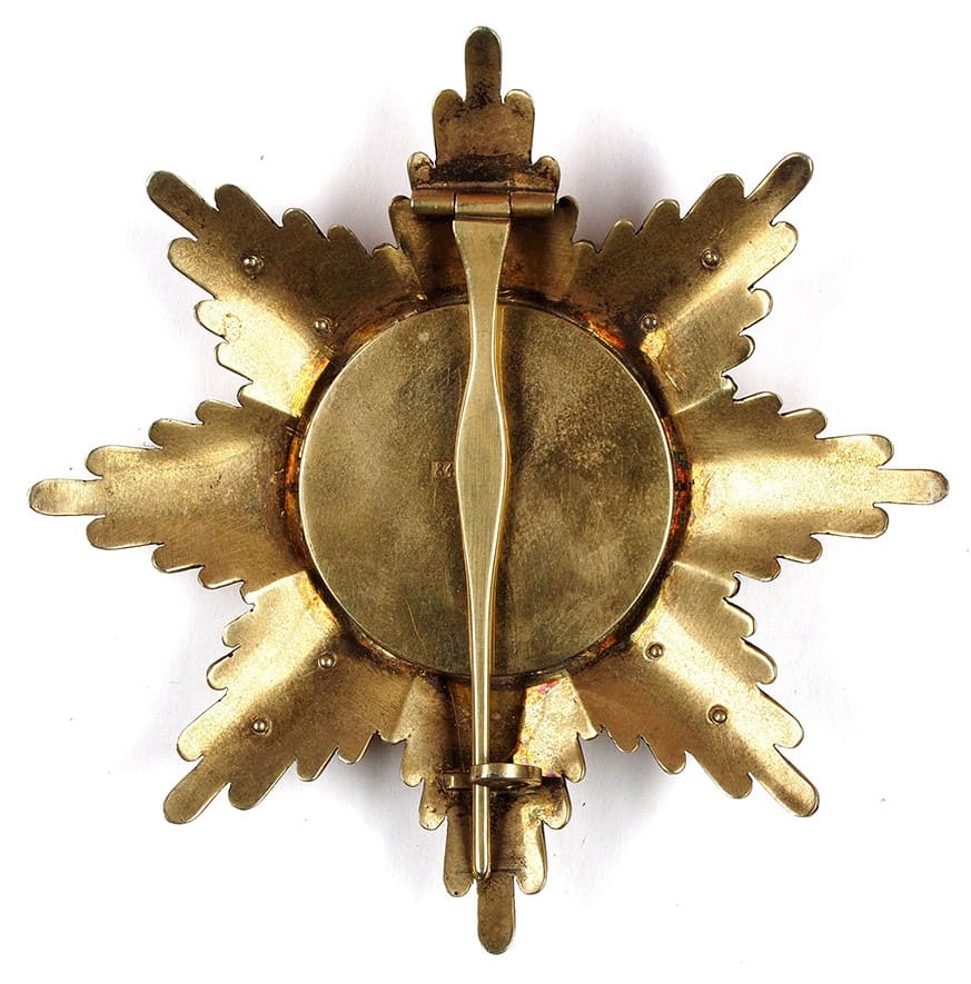 Order of the  White Eagle fake breast star with swords.jpg