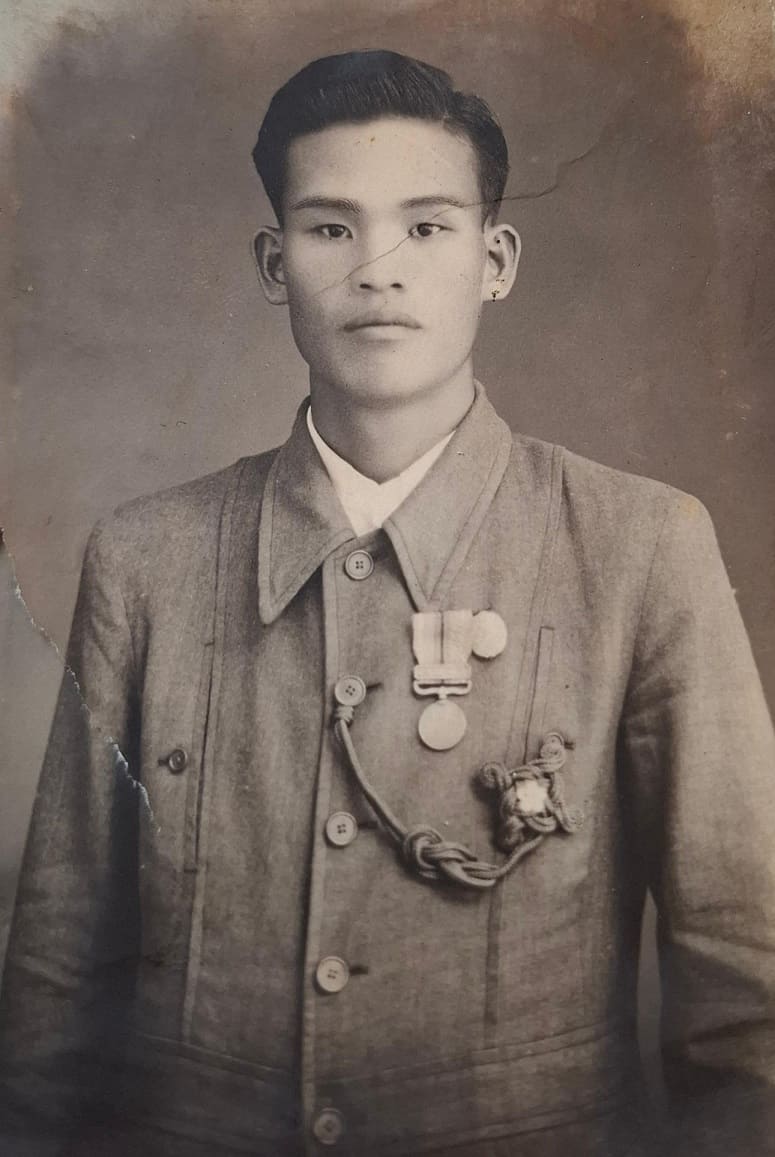 Photo with ceremonial cord.jpg