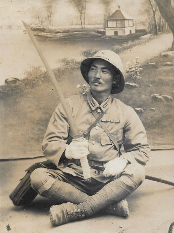 Photo with Japanese Army Sun Helmet.jpg