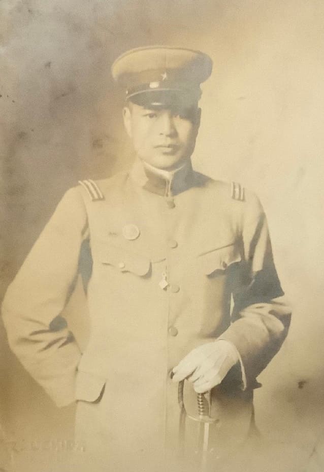 Photo with Japanese Imperial Reservist Badge.jpg