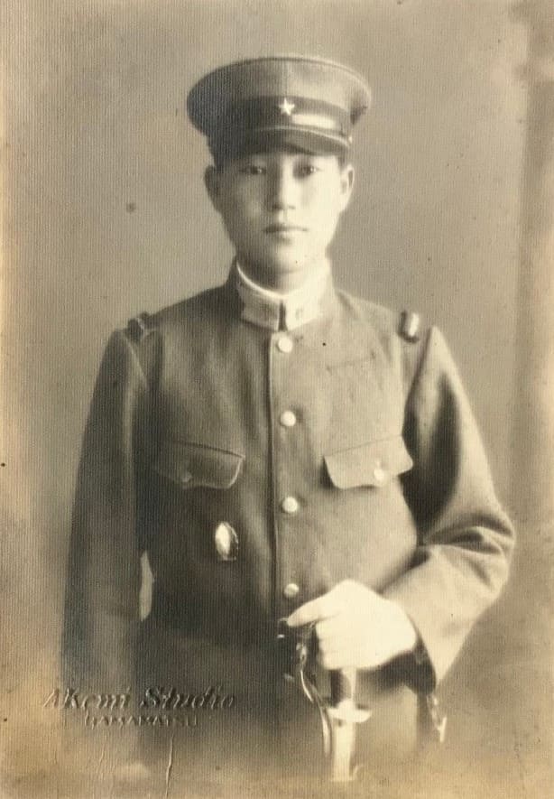 Photo with Japanese NCO badge.jpg