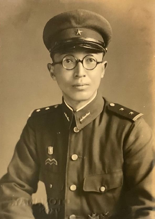 photo with two sharpshooter's badges.jpg