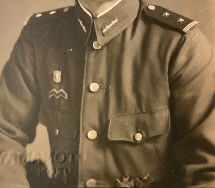 photo with  two sharpshooter's badges.jpg