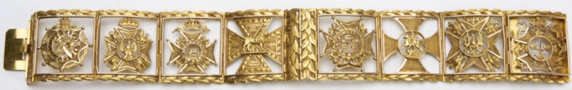 Pierced and hinged panel bracelet with order miniatures.jpg