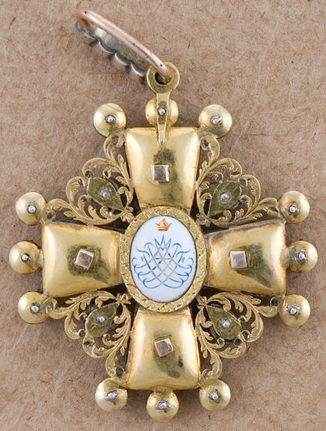 Privately  commissioned 1st class cross in gold.jpg