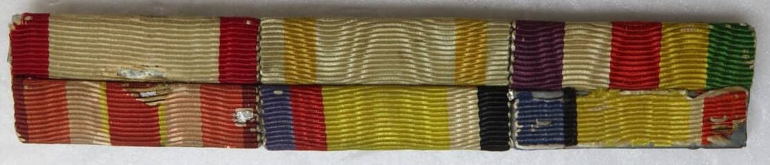 Ribbon bar with two Manchukuo Medals.jpg