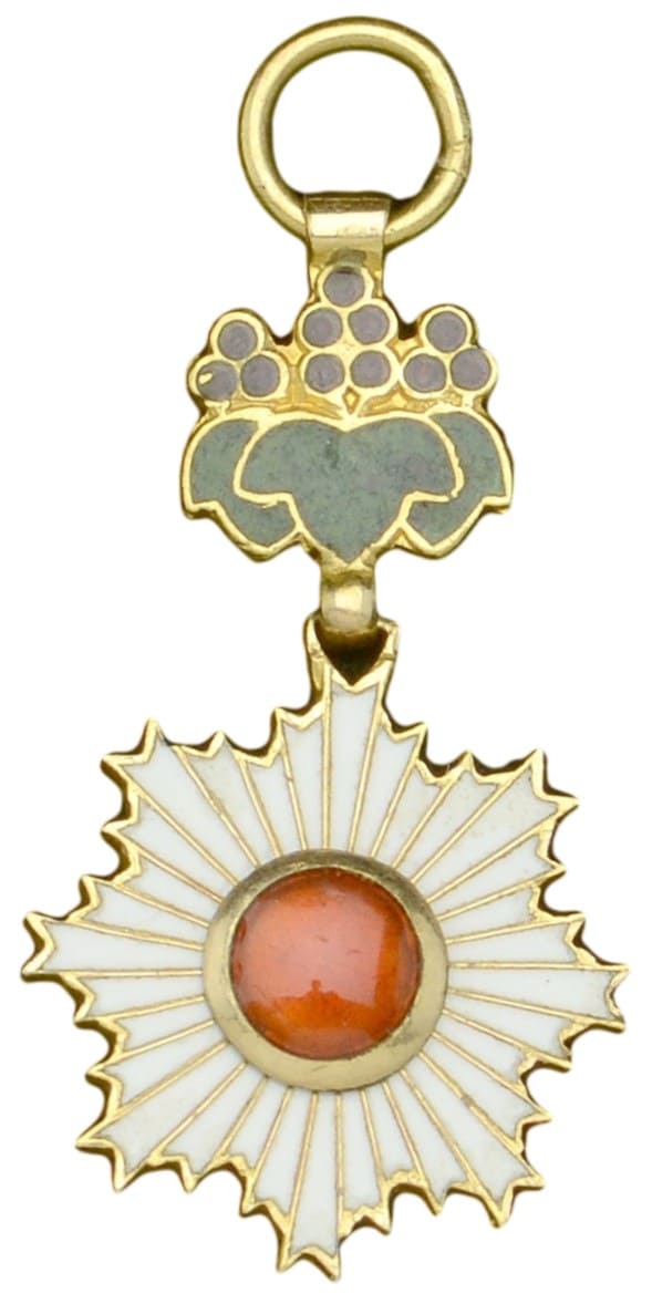 Rising Sun, gold and enamel, with red cabochon centre.jpg