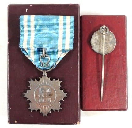 Shobukai (Warlike Spirit” Martial Arts Association) Kobe City Medal and Badge.jpg