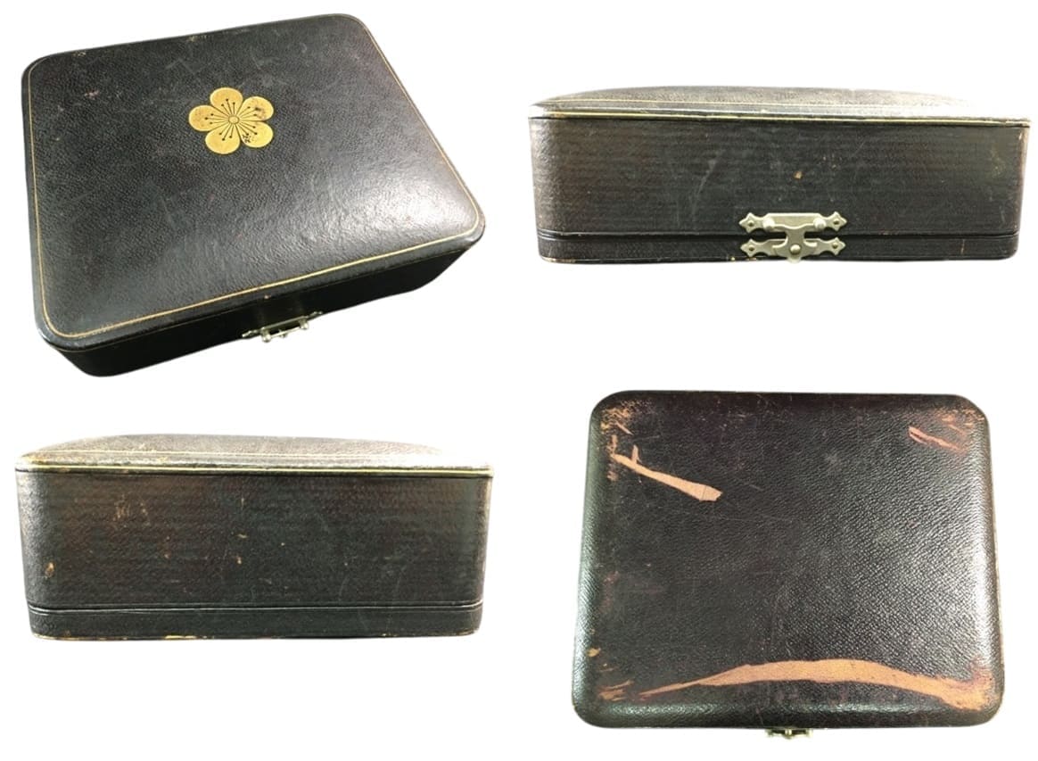 Silver case with a gilded Imperial Seal of Korea.jpg